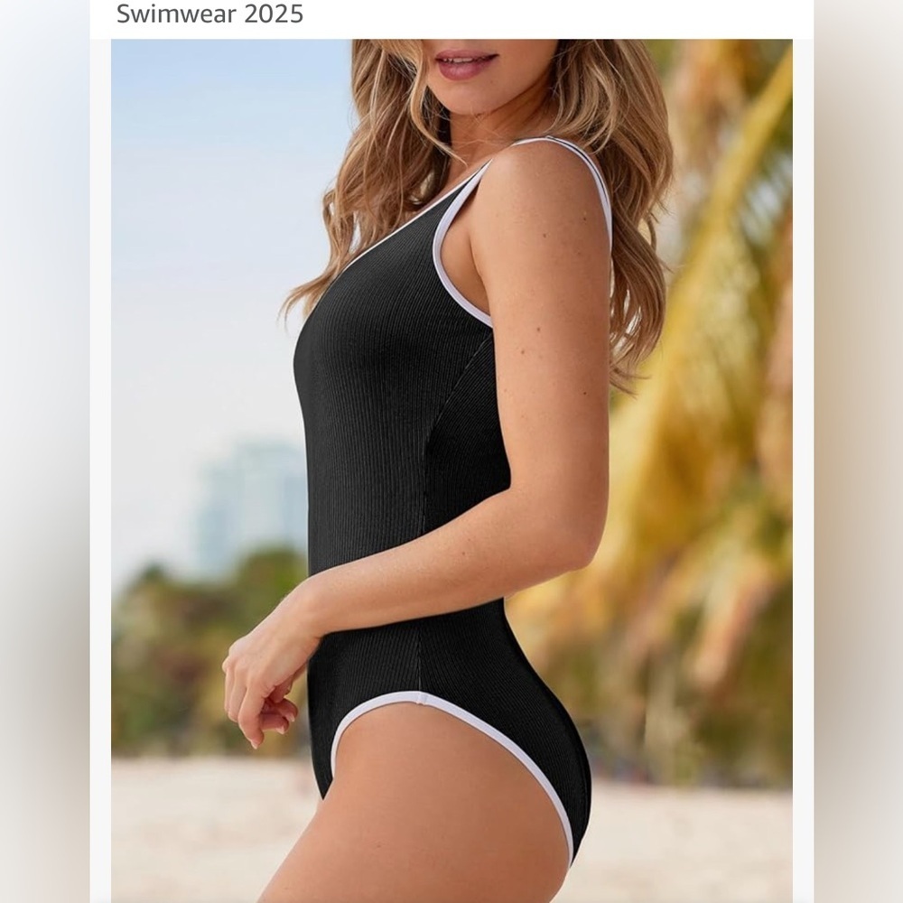 NEW- Elegant Black Ribbed 
white trim Swimsuit
2025 Season
Large - Picture 2 of 6